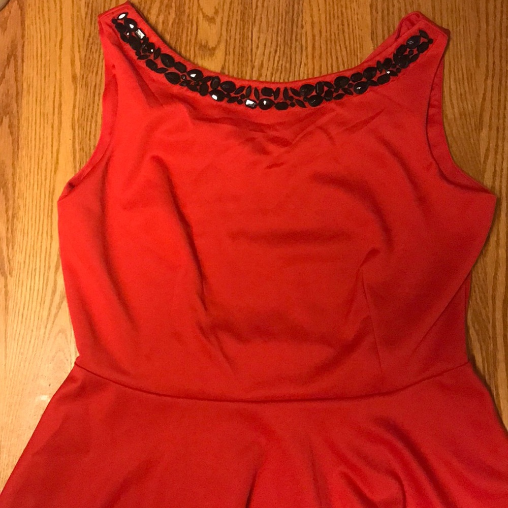 Red sleeveless Top with Black bead neck